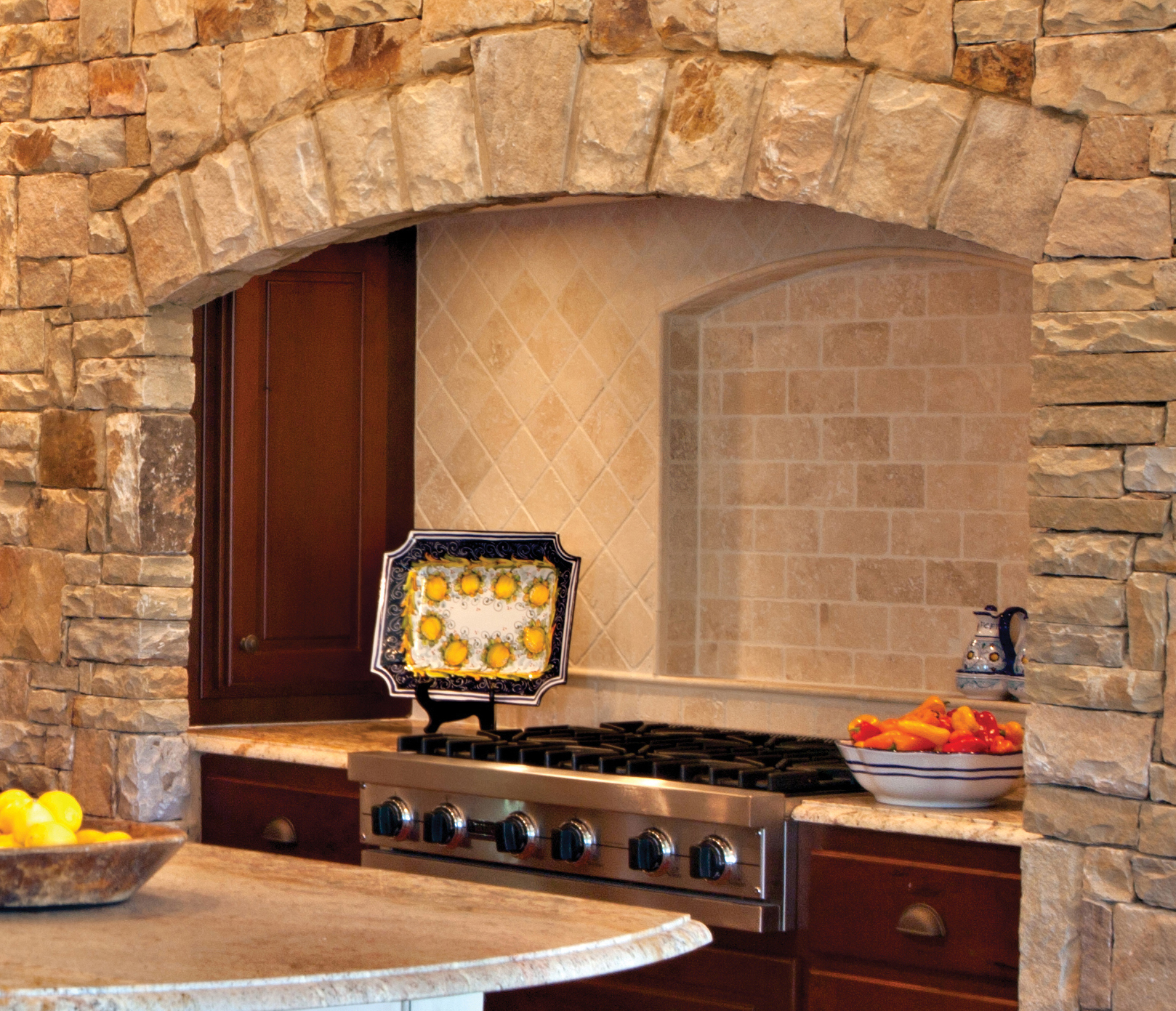  rustic stone alcove kitchen backsplash by Elizabeth Swartz Interiors