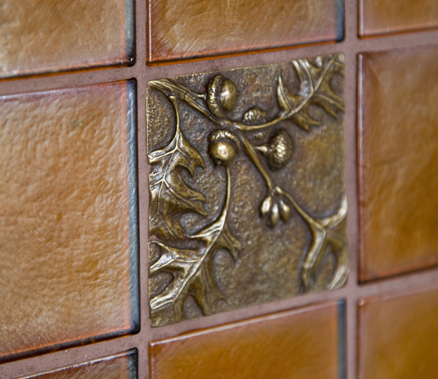 Glass and bronze tile kitchen backsplash by Elizabeth Swartz Interiors