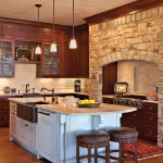 The large family kitchen of a Georgia lake house with interior design by Boston Interior Designer Elizabeth Swartz Interiors.