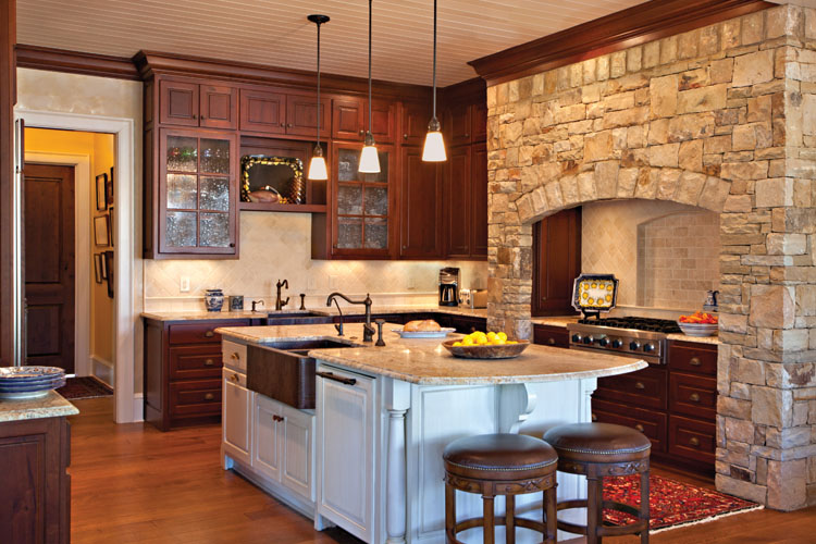 The large family kitchen of a Georgia lake house with interior design by Boston Interior Designer Elizabeth Swartz Interiors.