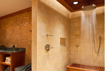 The master bath of a sophisticated mountain retreat combining modern outdoor motifs and rustic materials.
