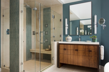 Bathroom of a contemporary interior design by Boston Interior Designer Elizabeth Swartz Interiors blending sophisticated materials such as natural stone, warm woods, and glass.