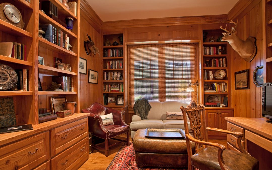 This Georgia vacation home on the lake even has a library. Library designed by Boston interior designer Elizabeth Swartz Interiors.