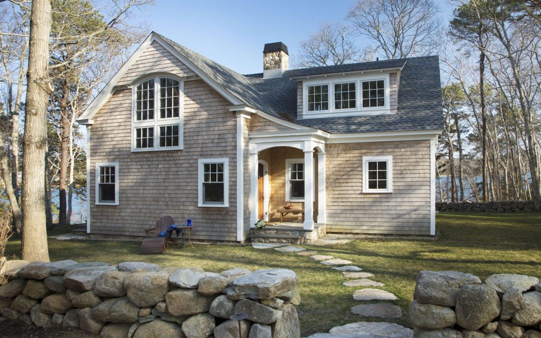 Although the square footage of this Martha's Vineyard home increased considerably, the exterior footprint and design stayed true to it's beach cottage roots and fits right in with it's surroundings on Lake Tashmoo.