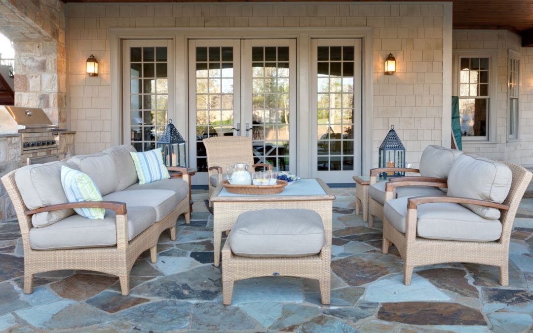 The patio off of the lower level game and family room offers easy access to the outdoors with plenty of shade.