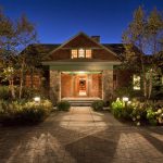 The main entrance of this White Mountain retreat designed by Boston Interior Designer Elizabeth Swartz Interiors makes a grand statement.