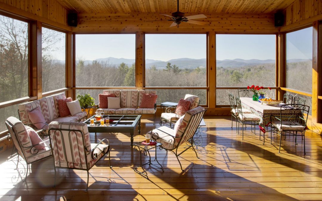 Screened in porch/sunroom of a Vermont home with interior design by Boston Interior Designer Elizabeth Swartz Interiors that was featured on a Houzz house tour.