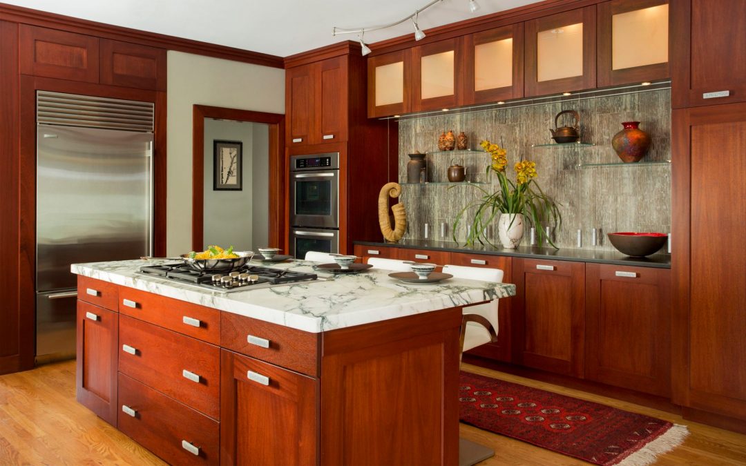 This Boston contemporary kitchen combines contemporary design elements with a diverse art collection with sophisticated materials such as natural stone, warm woods and glass.