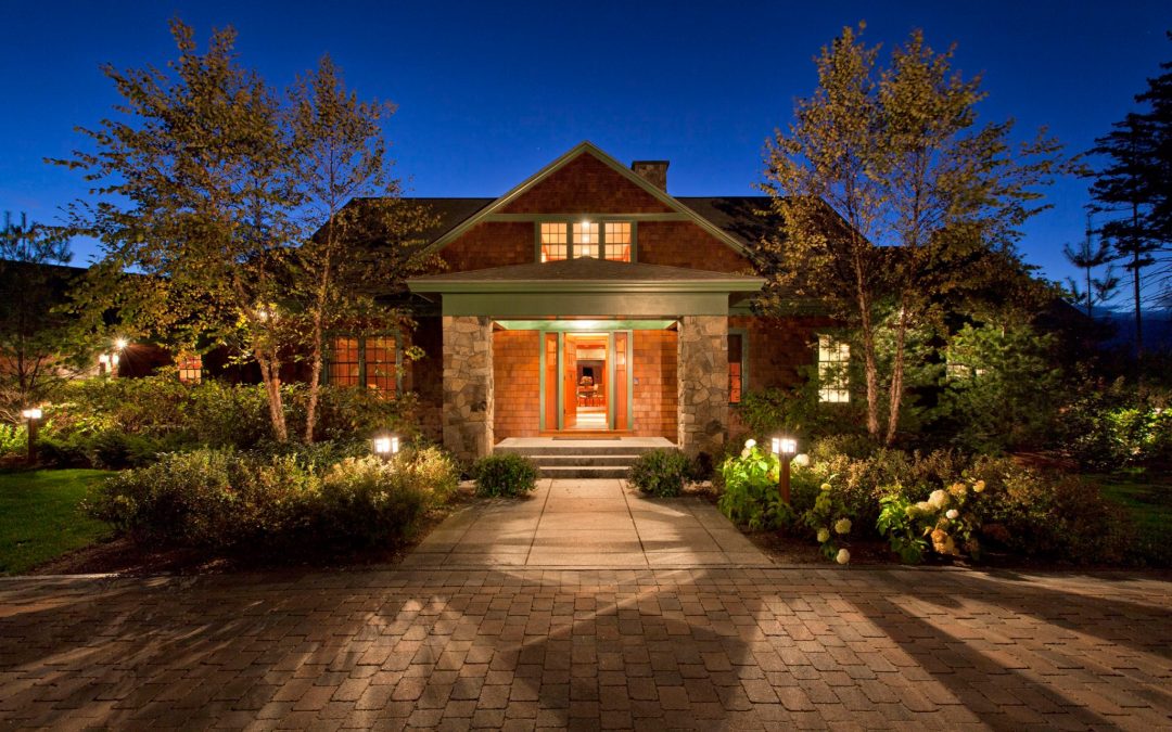 The main entrance of this White Mountain retreat designed by Boston Interior Designer Elizabeth Swartz Interiors makes a grand statement.