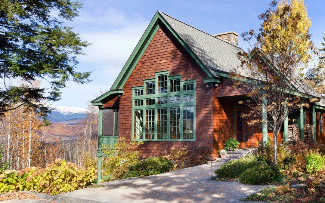 This White Mountain retreat utilizes large windows to take advantage of the beautiful view outside every angle of this home.