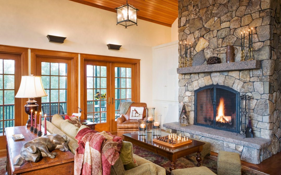 Cozy up next to the fire in the guest house of this White Mountain retreat with interior design by Boston Interior Designer Elizabeth Swartz Interiors.